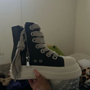 Size 7 1/2. Basic high top platform sneakers.